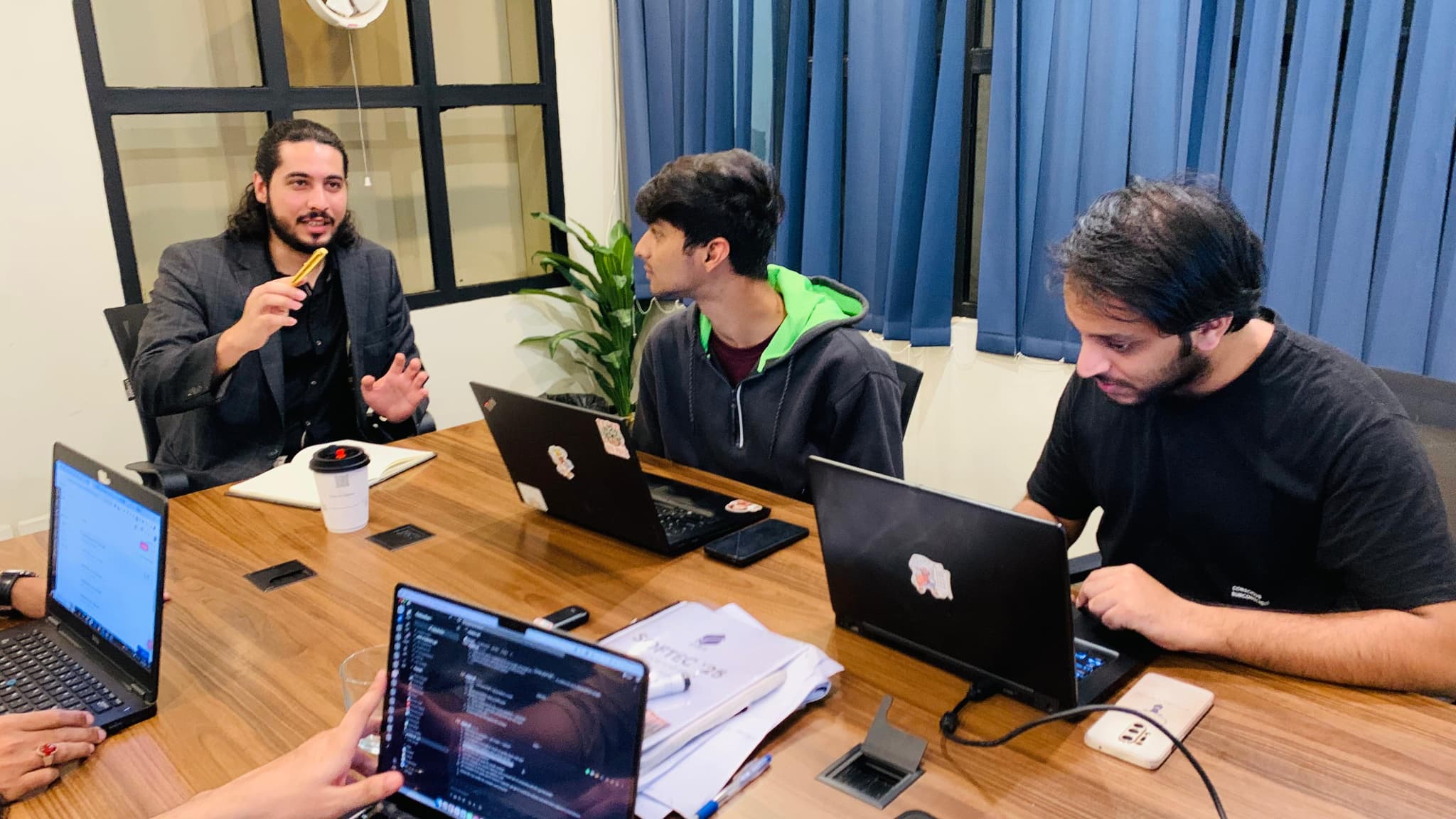 Ahmad Zabir leading a working session with his team